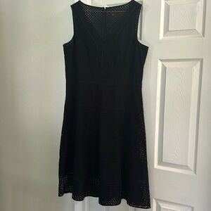MIDI length black dress.